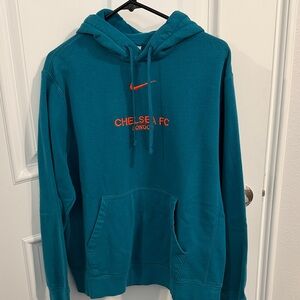 Nike Blue Hoodie with Orange Logo